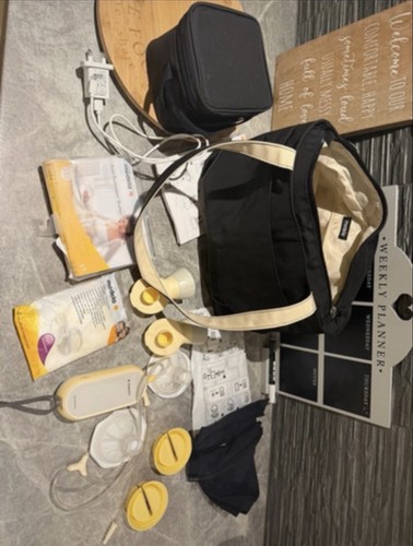 Medela electric breast pump - medela,