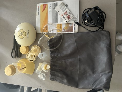 Medela electric breast pump - breast,